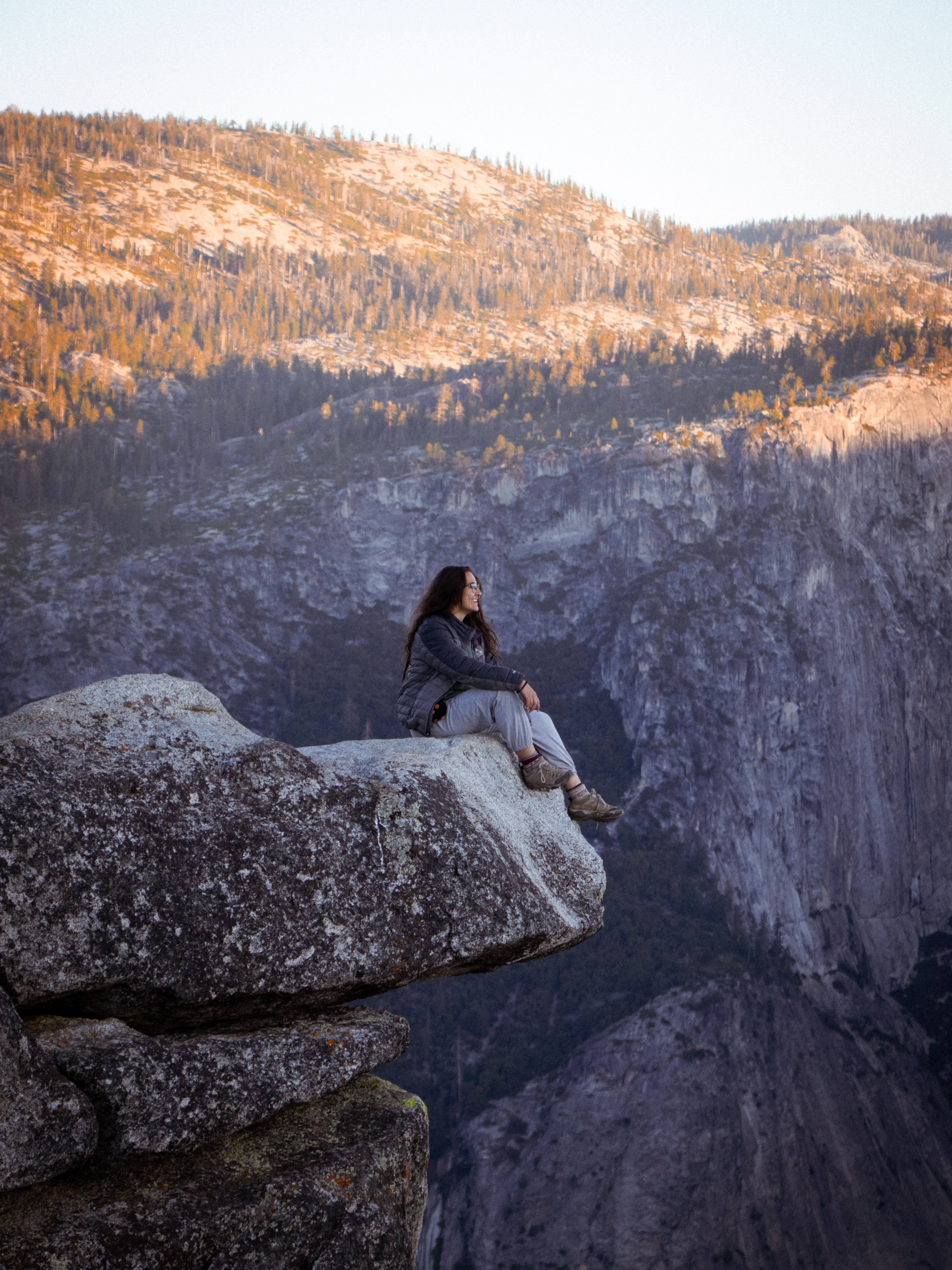 girl on ledge smiling